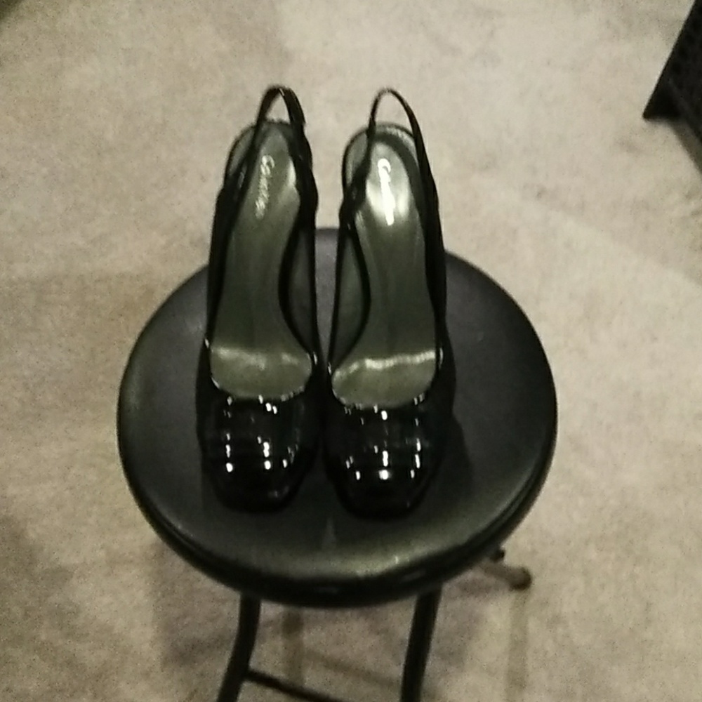 Calvin Klein slingback platform pumps.